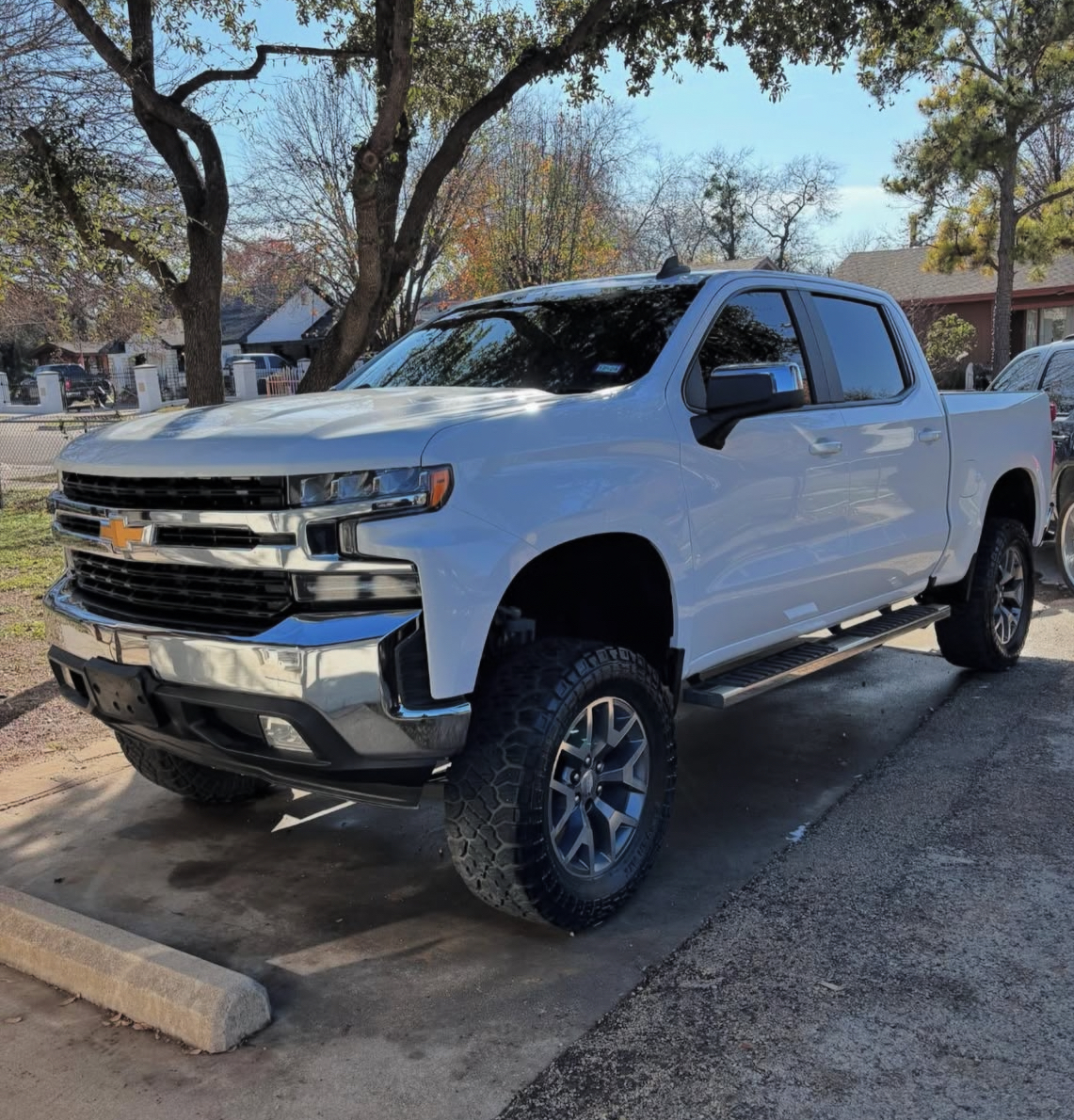 Chevy Silverado white lifted